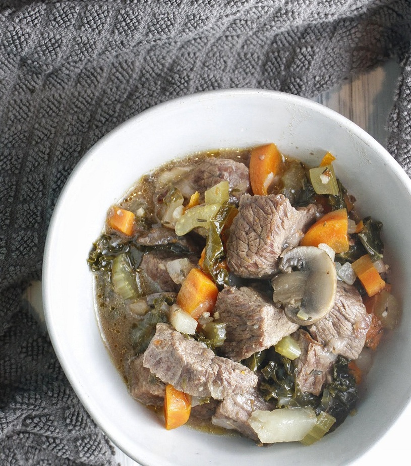 Instant Pot Low Carb Beef Stew in a Bowl on a Towel