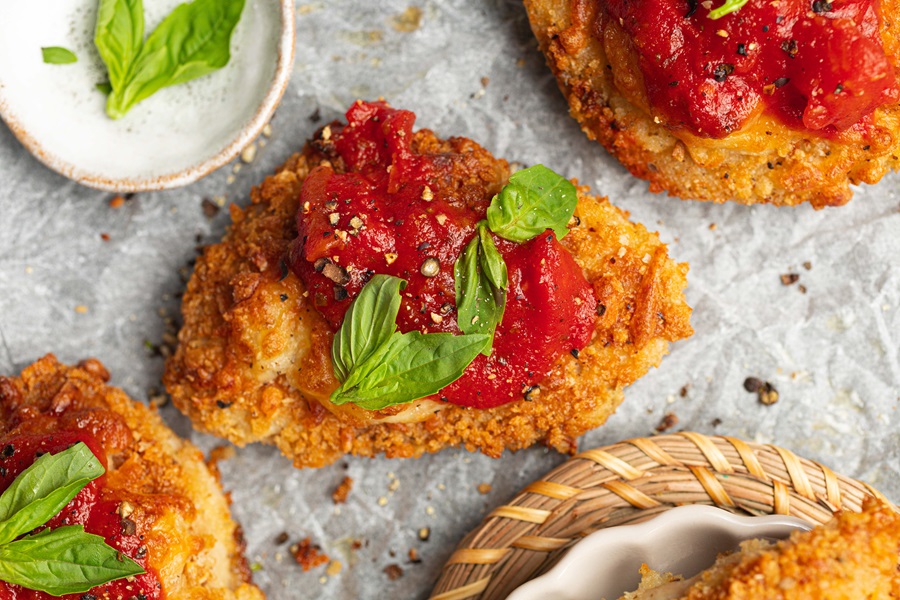Best Panko Chicken Parmesan Recipe Breaded Chicken Breasts Topped with Marinara Sauce and Basil