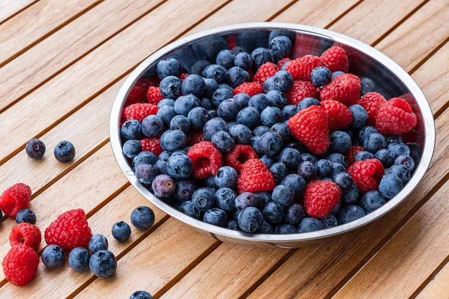 Colorful Margaritas for Spring a Bowl of Blueberries and Strawberries