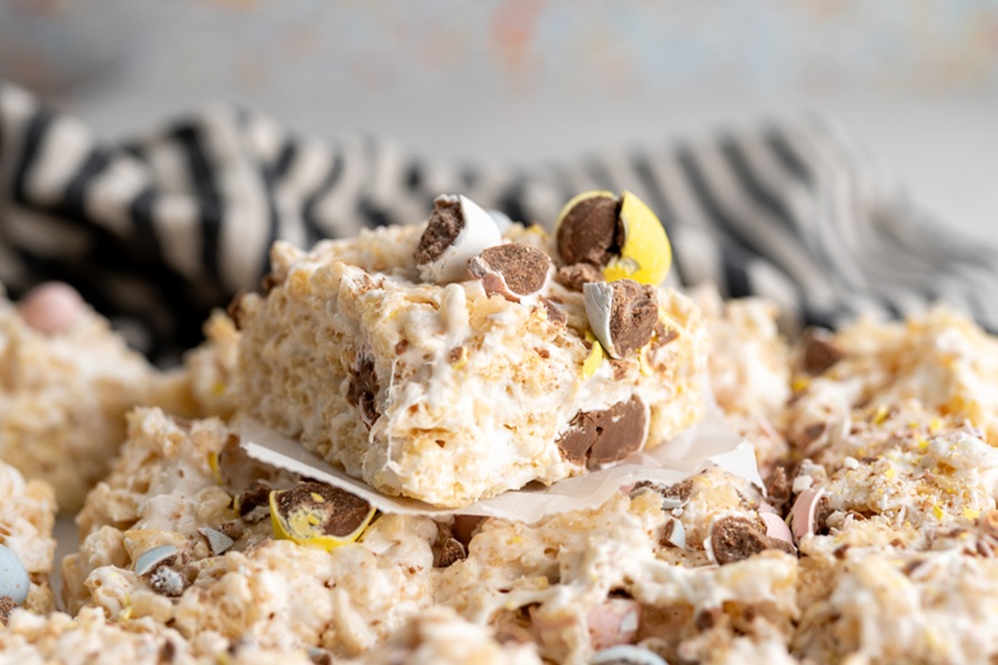 Rice Krispies Treats for Easter Close Up of Cadburry Rice Krispies Treats Stacked on Top of a Slab of Treats