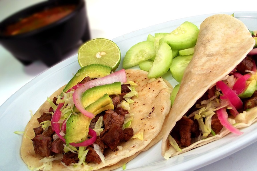 Cinco de Mayo Foods for Fiestas a Plate of Tacos with Half a Lime