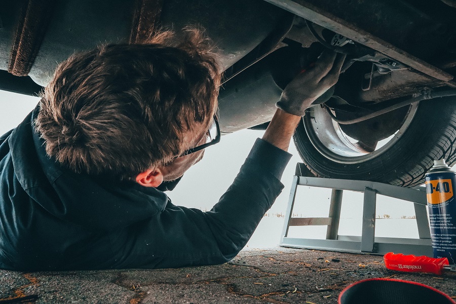 Amazon Echo Show a Mechanic Working on a Car