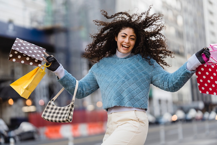 Amazon Echo Show a Woman Holding Shopping Bags Smiling