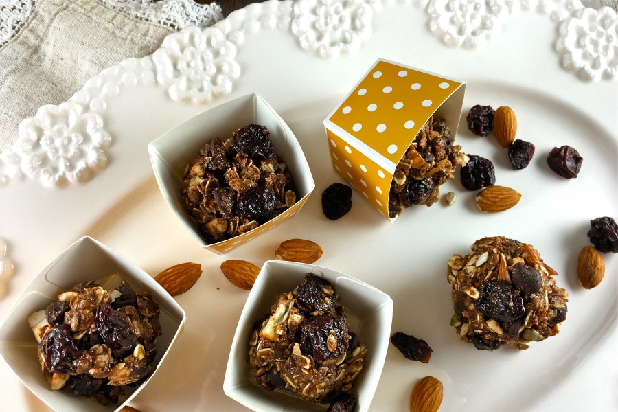 No Bake Oat Chocolate Cherry Bars Chocolate Oat Balls on a Serving Platter in Small Popcorn Cups