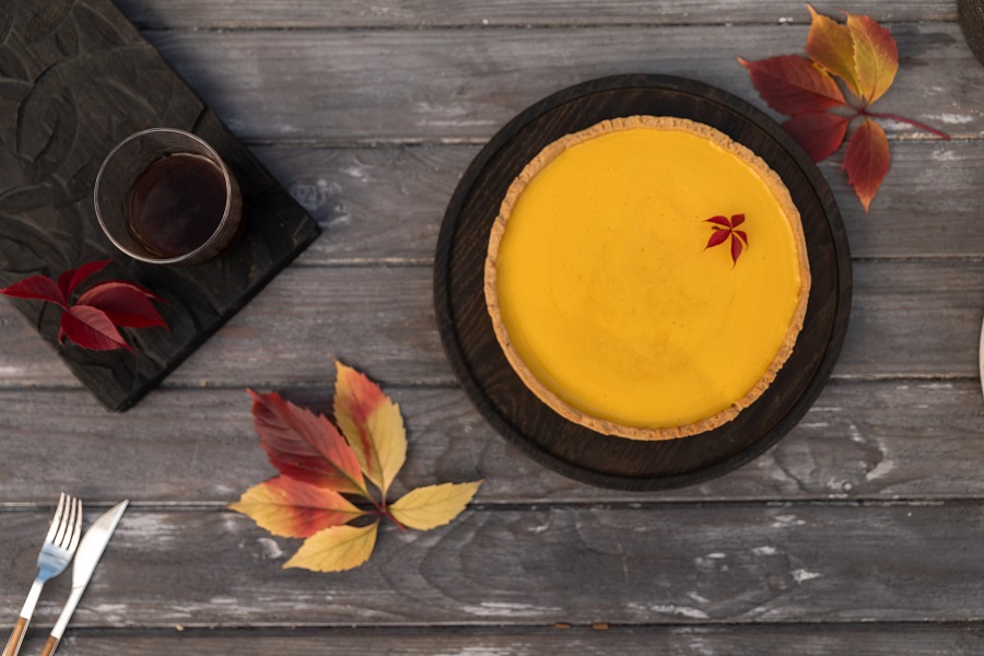 Dairy Free Pumpkin Pie Recipes a Smooth Pumpkin Pie on a Wooden Surface Next to a Leafe