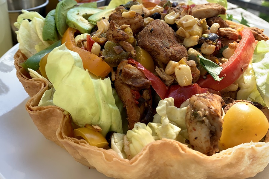 Dairy Free Slow Cooker Chicken Fajitas Recipe Close Up of a Taco Bowl Filled with Chicken Fajitas