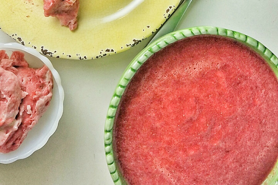 Delicious Dairy Free Desserts a Watermelon Bowl Filled with Strawberry Ice Cream Next to a Yellow Plate with Ice Cream