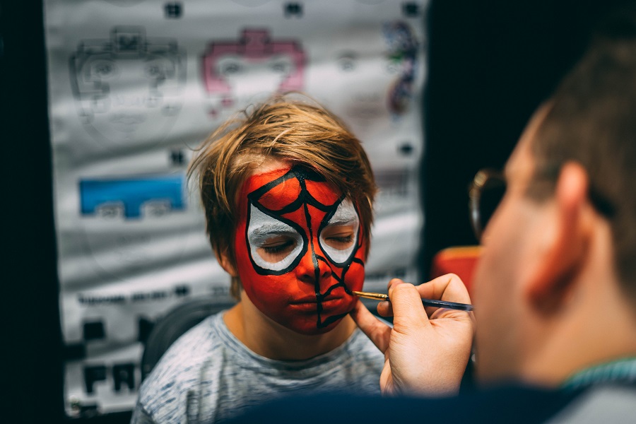 DIY Halloween Costumes  a Young Boy Getting His Face Painted to Look Like Spiderman