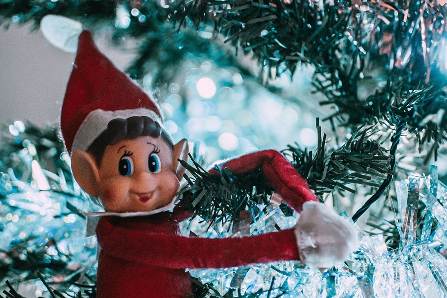 Easy Elf on The Shelf Ideas Close Up of an Elf in a Christmas Tree