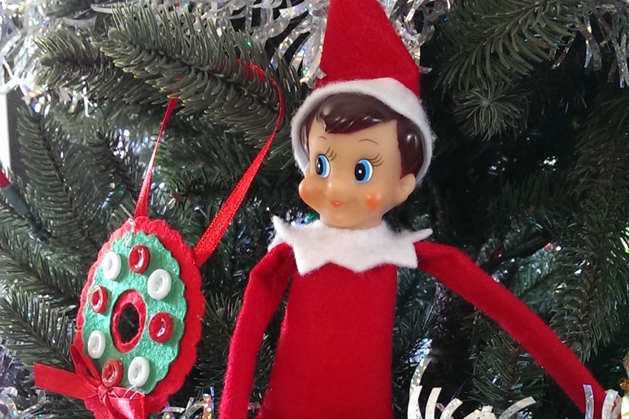 Funny Elf on a Shelf Ideas Close Up of an Elf Sitting in a Christmas Tree Next to an Ornament
