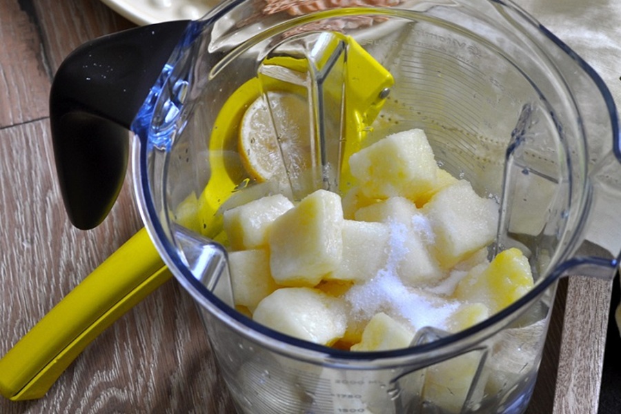 Make at Home Dole Whip Recipe a Blender Filled with Pineapple Chunks