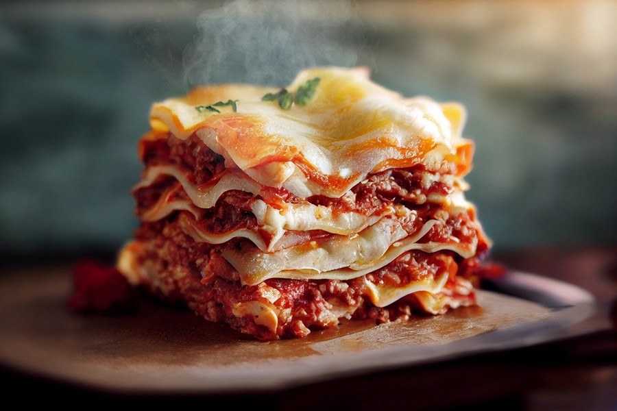 Crockpot Lasagna Recipes with Spinach Close Up of a Beautifully Stacked Piece of Lasagna Steaming