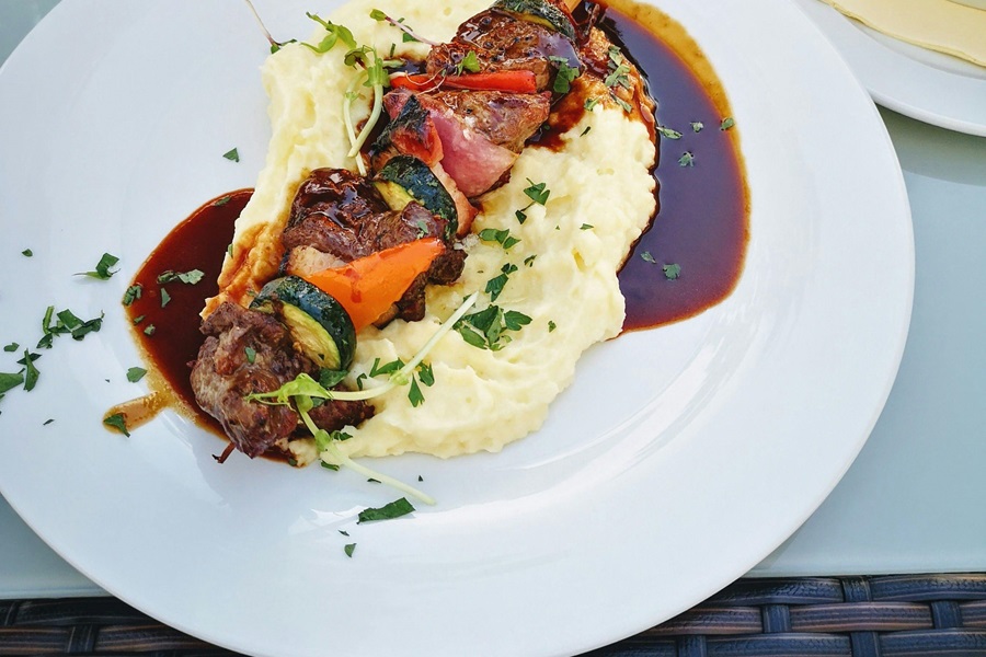 Dairy Free Instant Pot Mashed Potato Recipes Close Up of a Plate with Mashed Potatoes Topped with a Beef Kebab