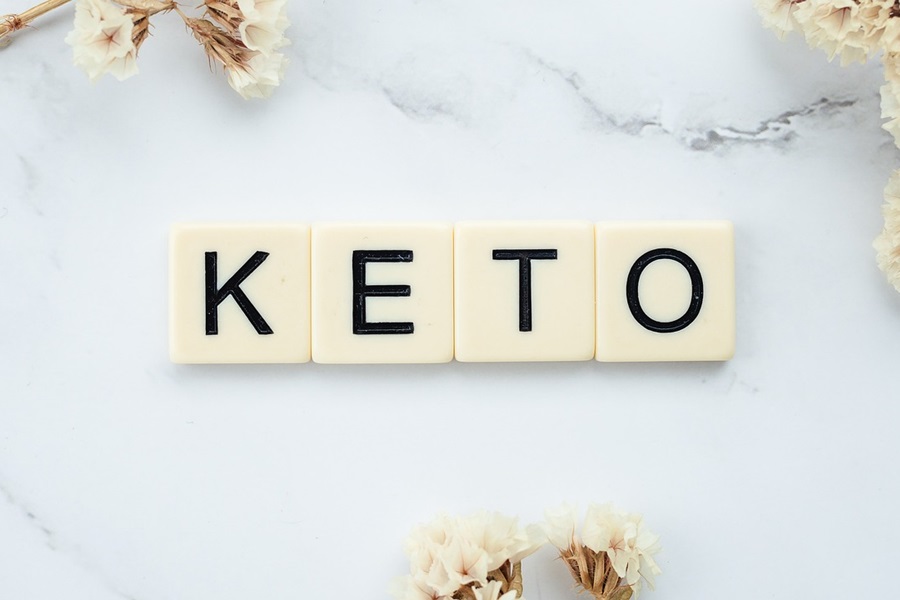 Tips for Starting a Ketogenic Diet Letter Tiles on a Marble Surface That Spell Out 'Keto'