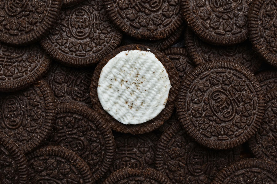 Awesome April Fool's Day Pranks to Play on your Husband a Bed of Oreos with a Single One Opened Showing the Cream