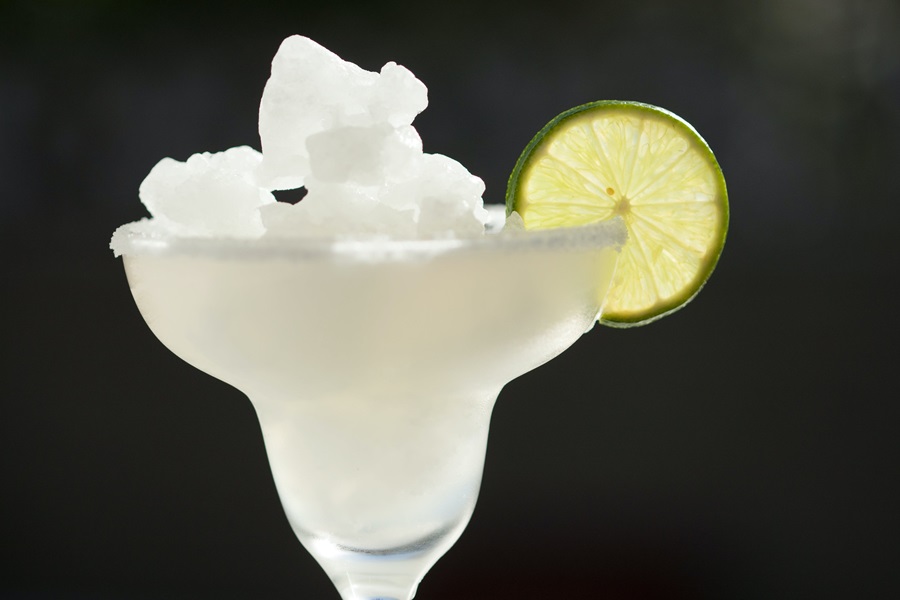 Margarita Recipes to Enjoy Close Up of a Lime Margarita Garnished with a Lime Slice