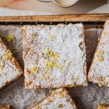 Lemon Bar Recipe Close Up of Lemon Bars on a Colling Rack
