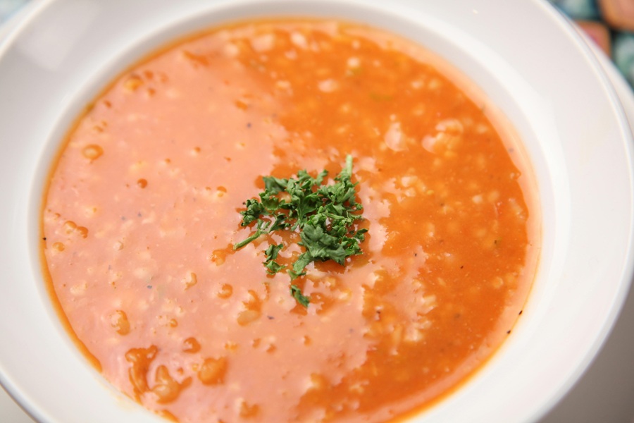 Low Carb Fat Burning Soup Recipes Close Up of a Bowl of Tomato Soup with Parsley On Top