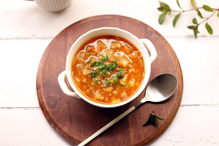 Crock Pot Soups for Fall Close Up of a Bowl of Soup Garnished with Herbs