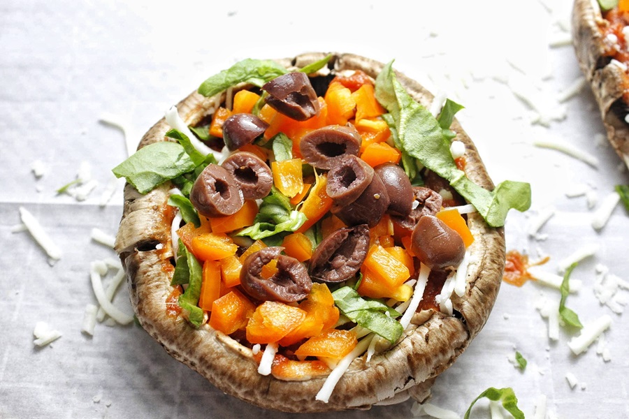 Easy Healthy Mushroom Pizza Recipe Overhead View of a Portobello Mushroom Pizza with Raw Ingredients on Top