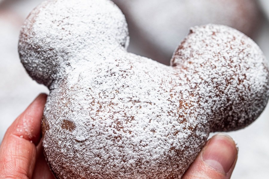Copycat Disneyland Beignets Recipe Close Up of Someone Holding a Finished Beignet