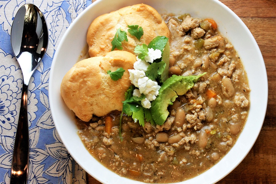 Healthy Slow Cooker Recipes with Chicken Close Up of a Bowl of Chicken Chili with Two Biscuits Inside