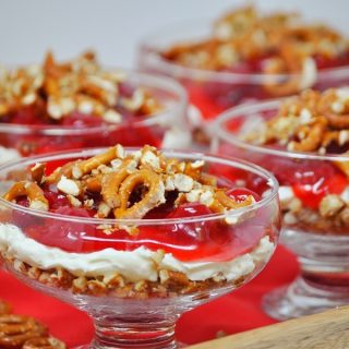 Valentines Day Desserts Close Up of a Strawberry Pretzel Dessert in Small Glasses