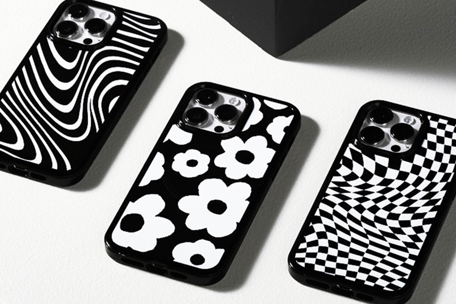 Otterbox Prefix vs Symmetry Close Up of Symmetry Cases with Black and White Patterns