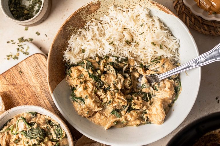 Crock-Pot Spicy Chicken Bowl Recipe with Spinach Overhead View of a Bowl of Chicken and Rice with Spinach