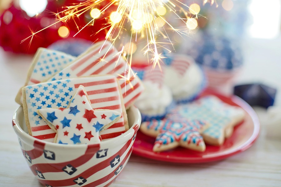 55 Patriotic Dessert Recipes Sugar Cookies with American Flag Frosting with a Sparkler