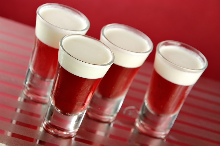 Easy Margarita Jello Shots for Margarita Lovers Red Jello Shots Topped with Cream