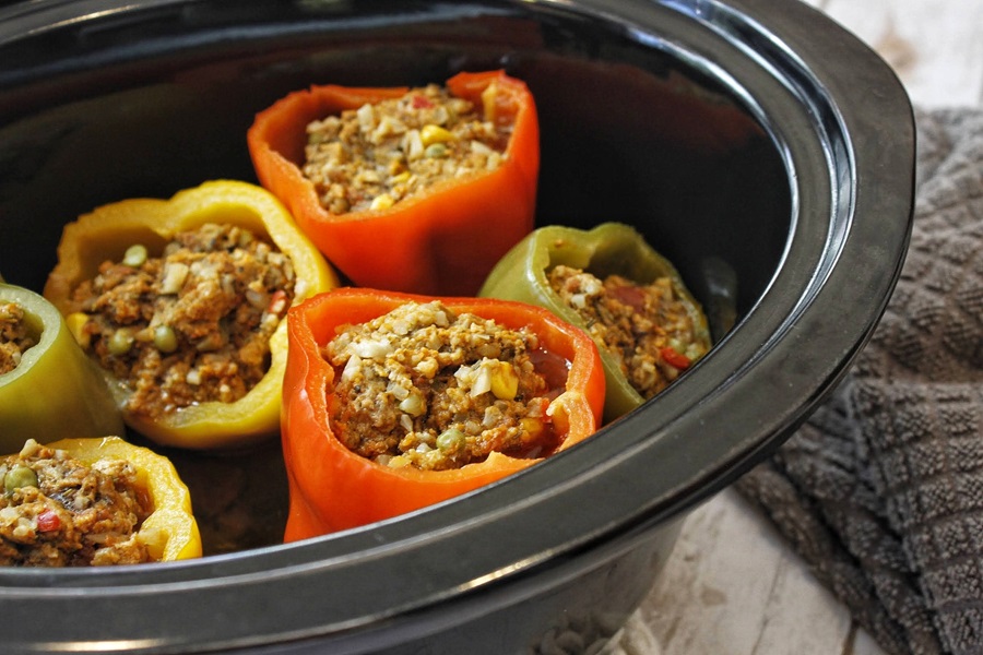 Easy Low Carb Crockpot Recipes Close Up of a Crockpot Filled with Stuffed Bell Peppers