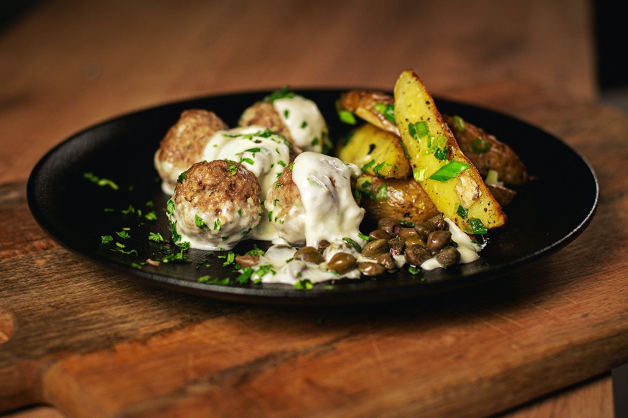 Low Carb Meatballs Recipe Ideas a Black Plate of Meatballs Covered in a White Sauce