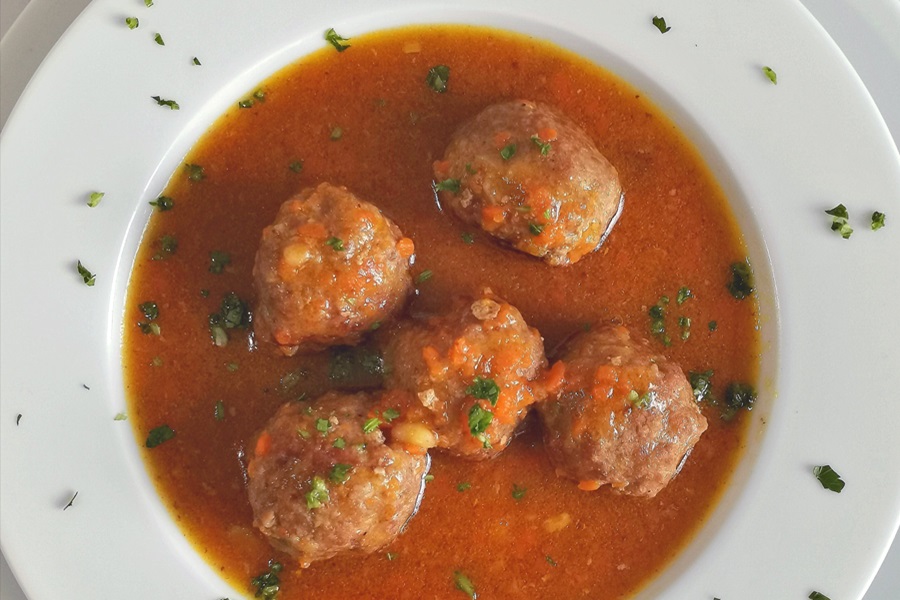 Low Carb Meatballs Recipe Ideas Overhead View of a Plate with Five Meatballs in a Tomato Sauce
