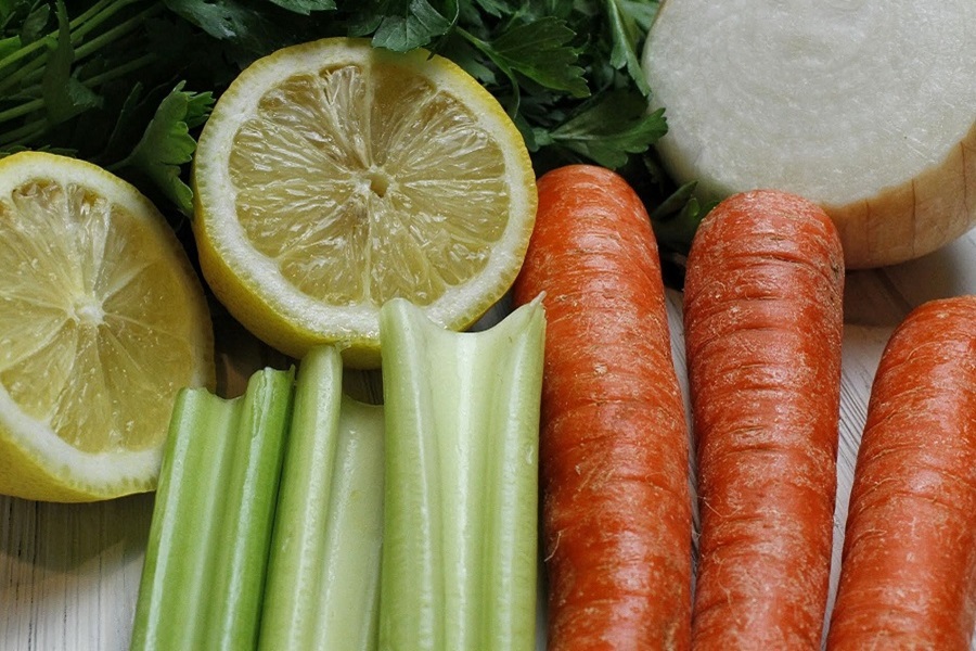 Low Carb CrockPot Recipes with Chicken Close Up of Carrots, Celery, Lemon Slices, and Parsley