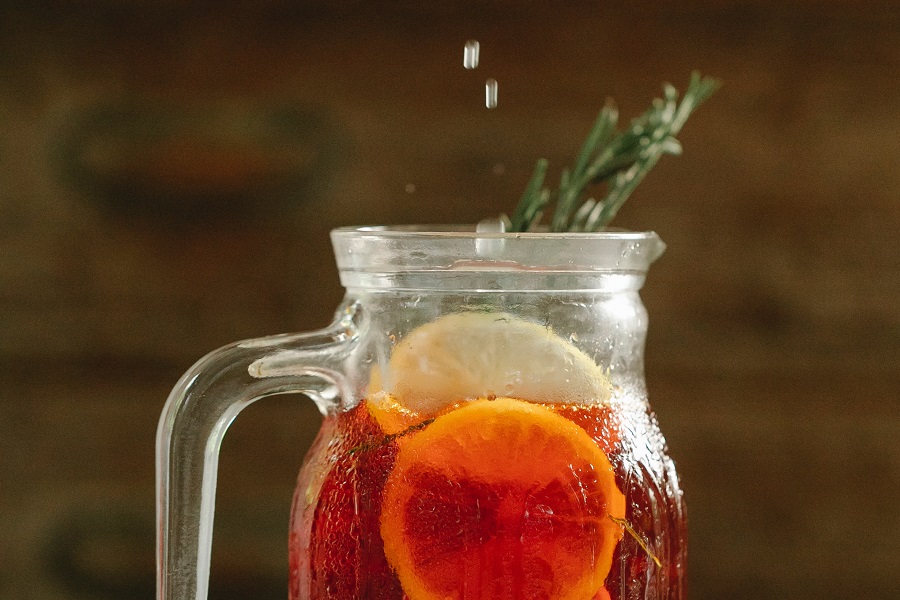 Fall Red Wine Sangria Recipes Close Up of a Small Pitcher of Sangria with Fruit Slices Inside