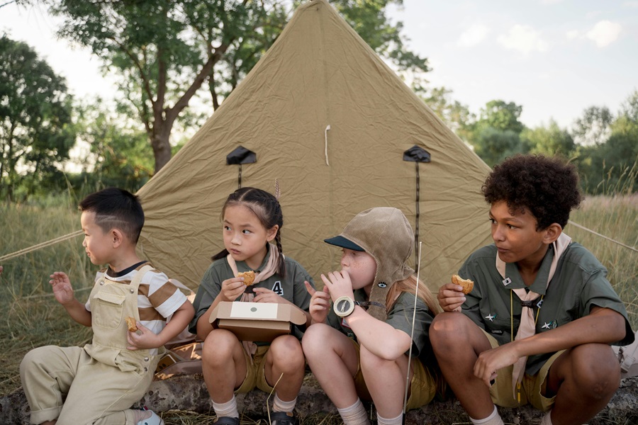 Healthy Chicken Recipes a Group of Kids Eating Outside of a Tent in a Field