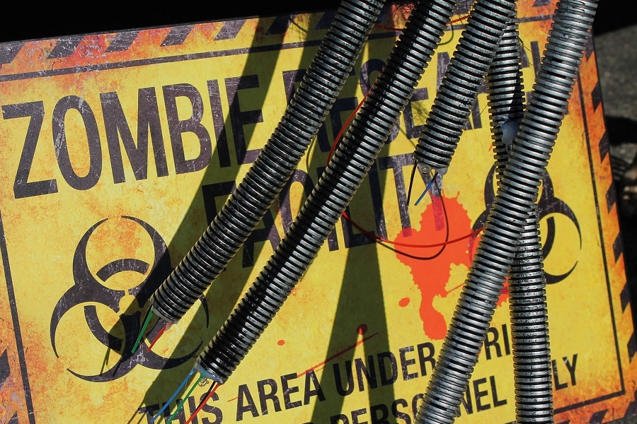 Crockpot Halloween Recipes for All Ages A Zombie Warning Sign with Wires Hanging in Front of It