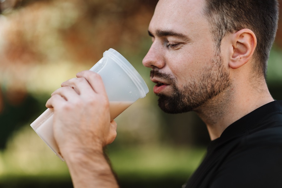Best Protein Powder for Diabetics Close Up of a Man Drinking a Protein Shake
