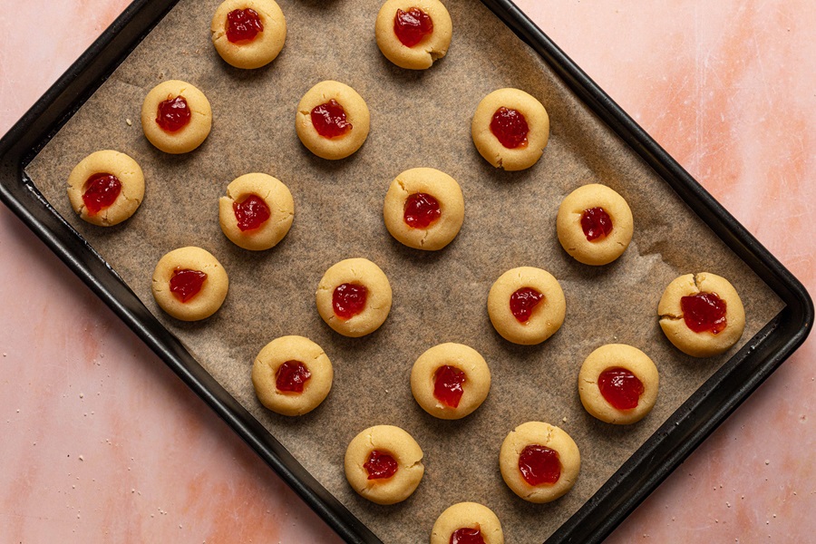 Thumbprint Cookies with Icing Recipe Close Up of Cookies Filled with Jam