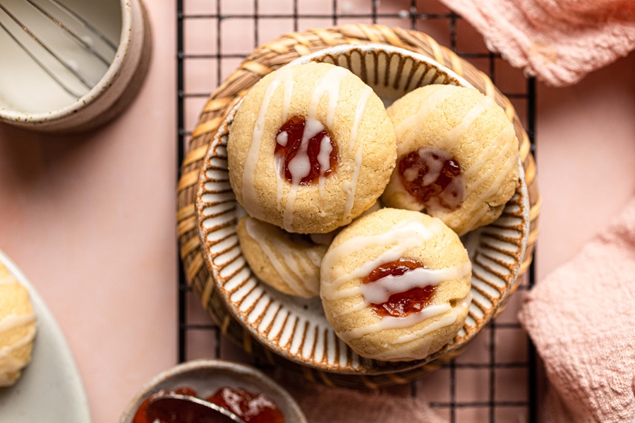 Thumbprint Cookies with Icing Recipe a Plate of Cookies on a Wire Rack