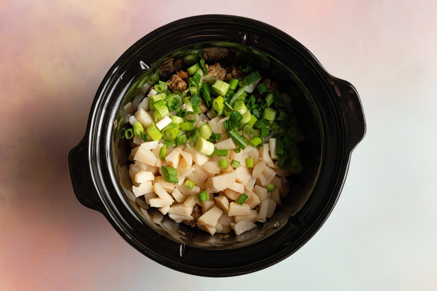 Copycat Pei Wei Chicken Lettuce Wraps Recipe Crockpot Filled with Chicken Mixture and Water Chestnuts and Scallions
