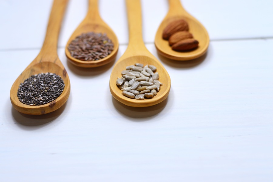 Best Dairy-Free Meal Replacement Shakes Close Up of Four Wooden Spoons Each Filled with Grains 