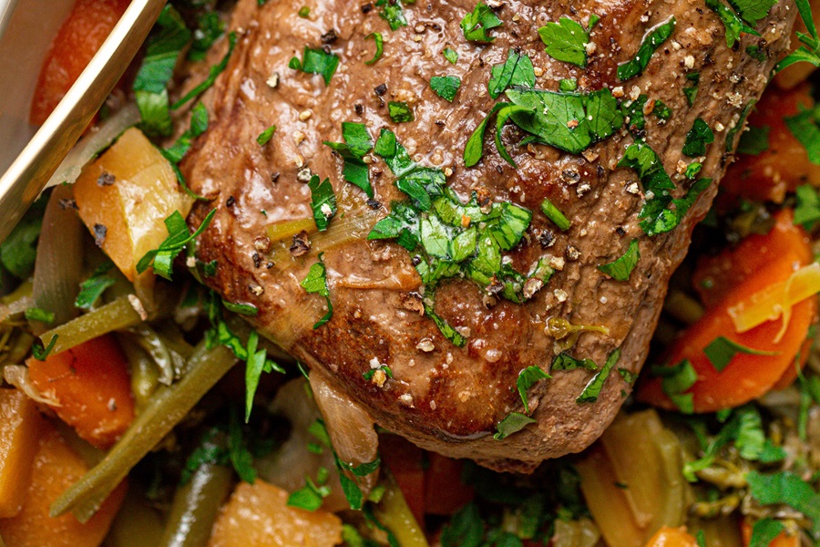 Old Fashioned Pot Roast Recipe in the Slow Cooker Close Up of One End of a Cooked Roast