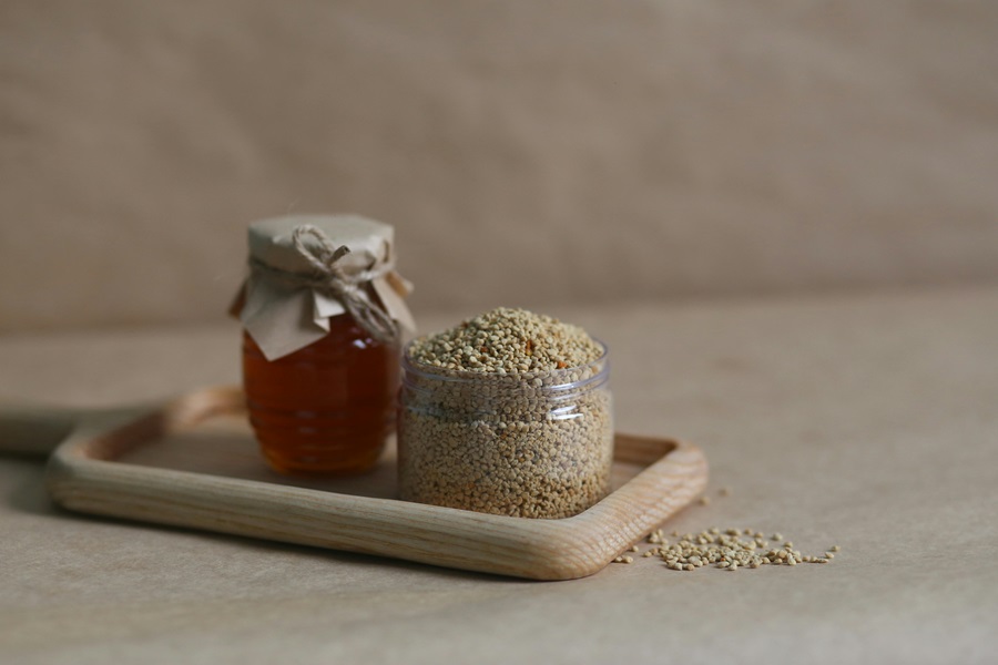 Jillian Michaels Bodyshred Meal Plan a Small Jar of Quinoa Next to a Small Jar of Honey