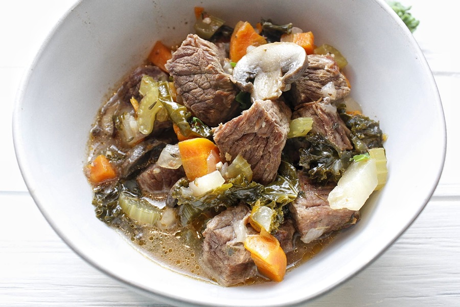 Slow Cooker Low Carb Beef Stew Recipe Close Up of a Bowl of Beef Stew with Fresh Kale