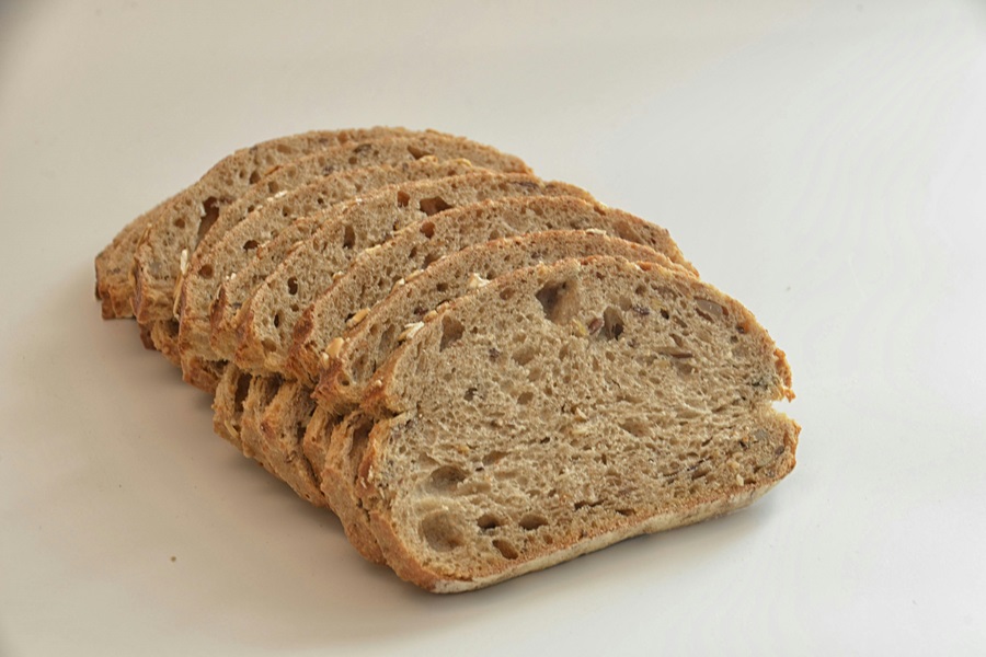 Is Gluten Free Bread Good for Diabetics Close Up of Sliced Wheat Bread on a White Surface