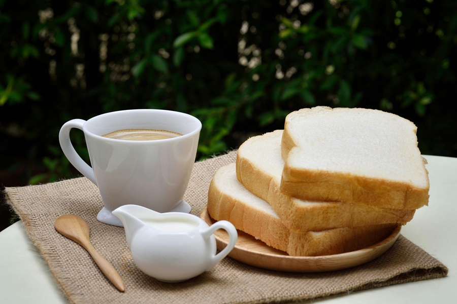 Is Gluten Free Bread Good for Diabetics a Stack of White Bread Slices on a Plate Next to a Cup of Tea