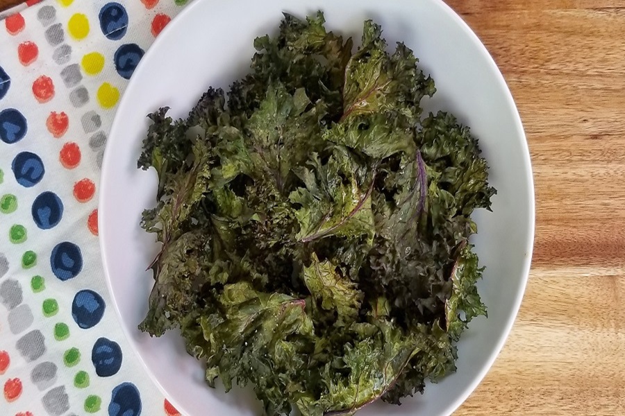 Healthy Summer Dinners  Close Up of Kale Chips in a White Bowl
