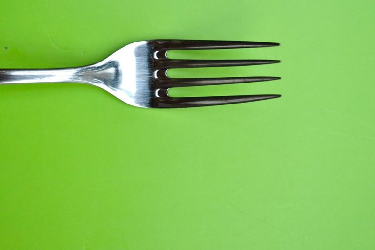 3 Ingredient Recipes a Single Fork on a Green Background